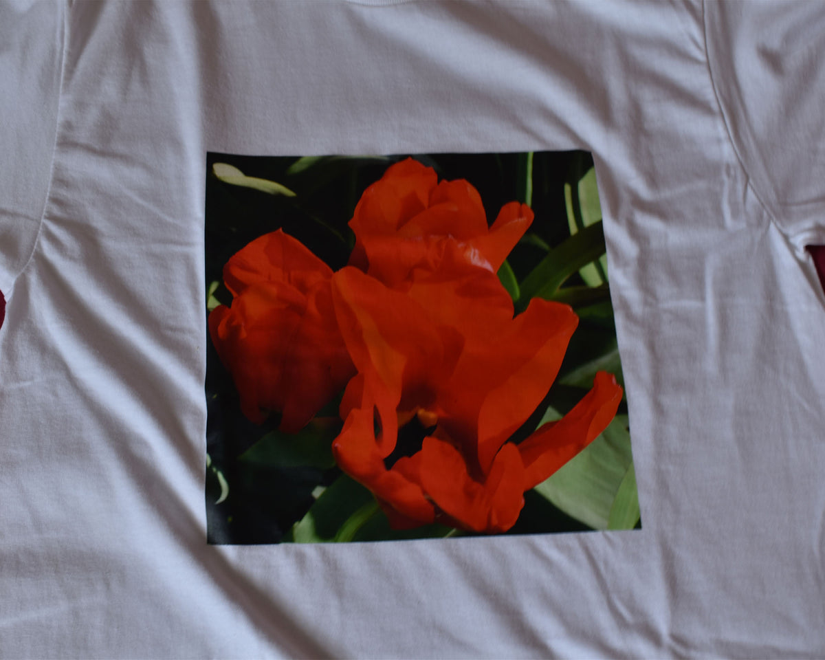 Red flower from Durham Park printed onto a white t-shirt